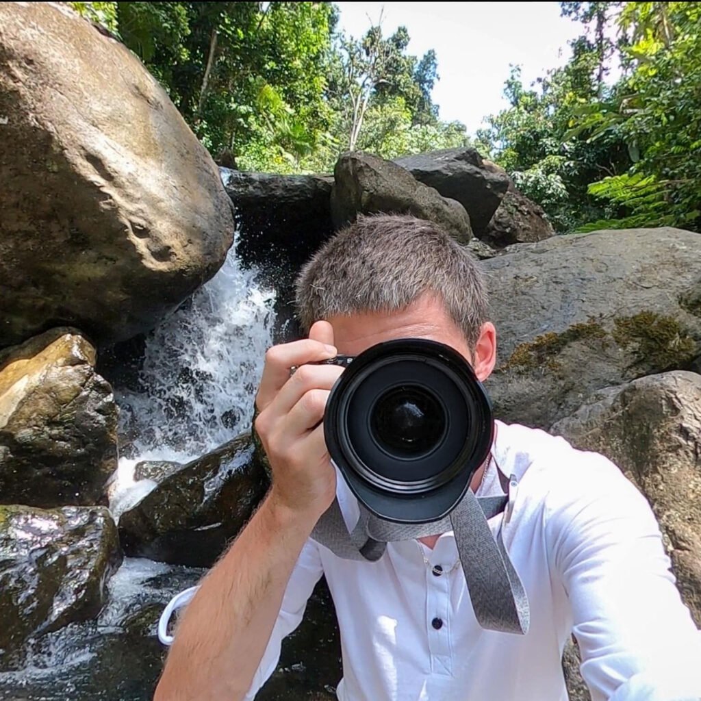 david looking at the camera through his camera